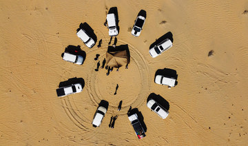 In this aerial view, Iraqi campers set up a tent in the Samawa desert south of Baghdad on February 2, 2024. (AFP)