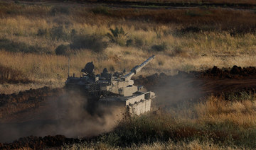 An Israeli tank maneuvers near the Israel-Gaza border in Israel, May 12, 2024. (Reuters)