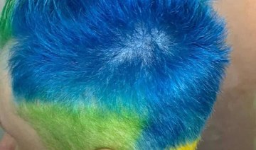 Russian court fines man for hair dyed in colors of Ukrainian flag, OVD-Info says