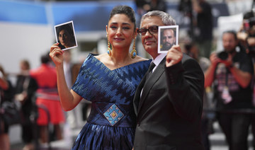 Escaped Iranian director receives ovations at Cannes