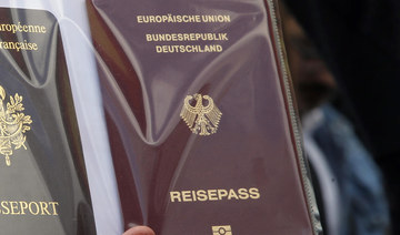 Number of new German citizens hits another high last year, with many Syrians naturalized