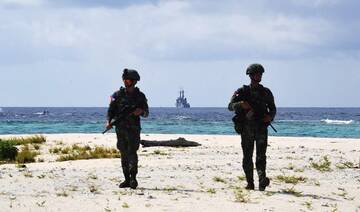 China’s military says it tracked Philippine patrol in South China Sea