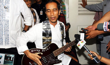 Indonesian governor surrenders Metallica guitar