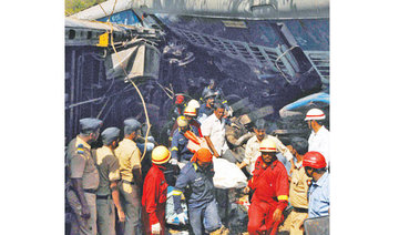 13 die as train crashes into ‘wedding’ car