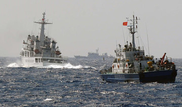 Vietnam accuses Chinese ships of gun threats