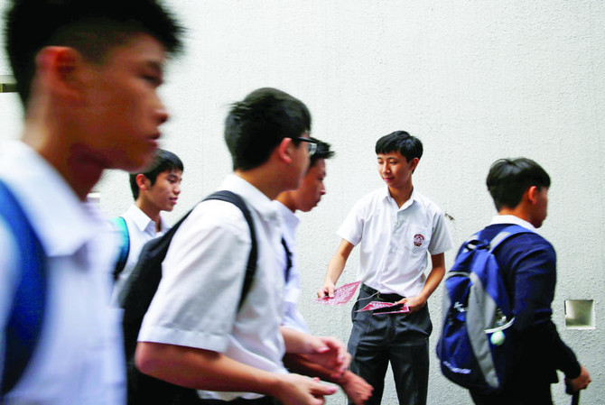 Hong Kong school term begins with some students urging independence