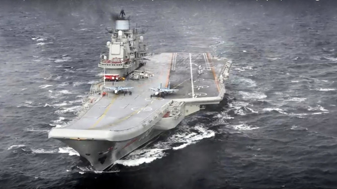 Russia says it starts Syrian drawdown with aircraft carrier