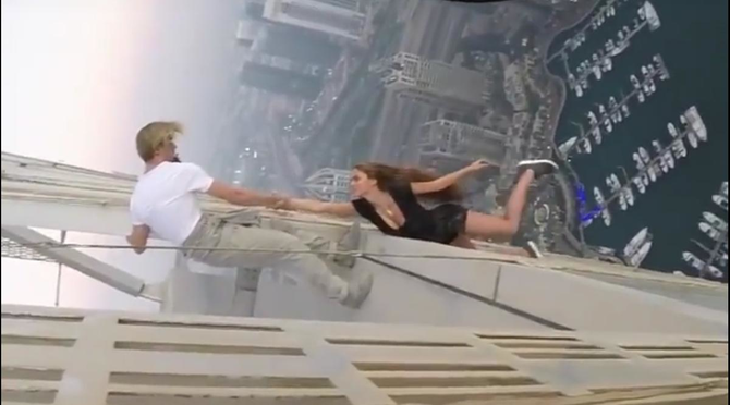 Dubai police summon Russian model who dangled from skyscraper-newspaper