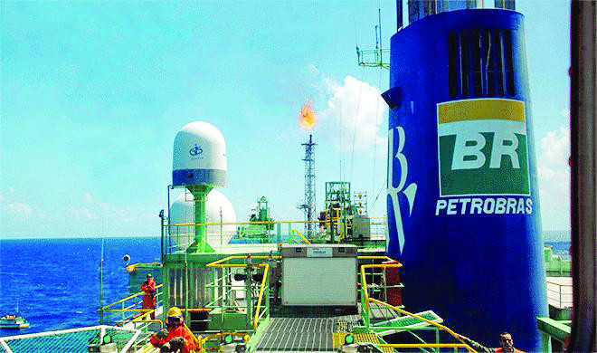 Debt-hit Petrobras to cut output goal by 14%