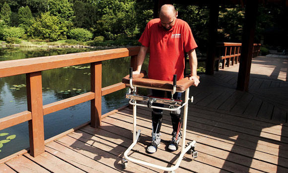 Paralyzed man walks again after breakthrough treatment