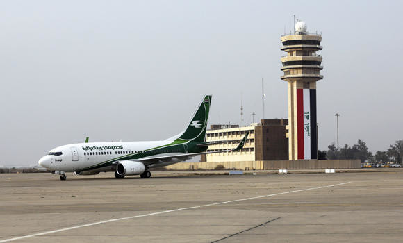 Airlines halt Baghdad flights after gunfire hits plane