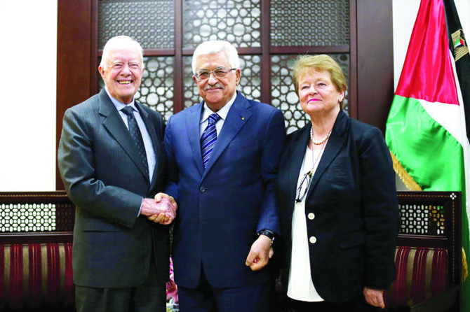 Carter urges Palestinian elections