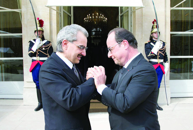 Hollande and Alwaleed meet at Elysee Palace