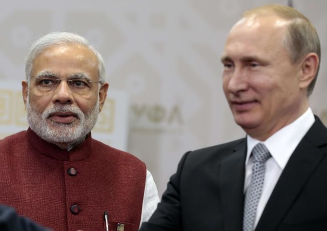 Putin tells India’s Modi will try yoga