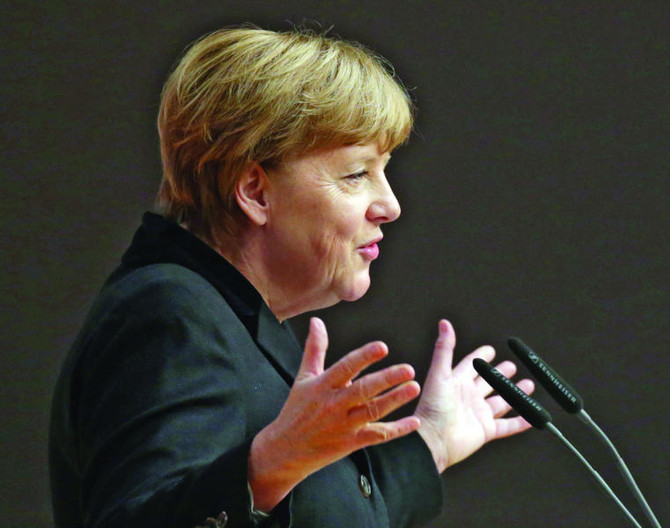 Merkel promises to reduce migrant inflow