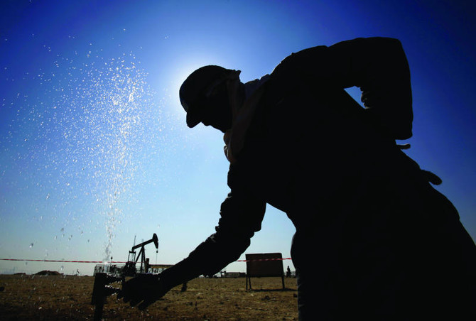 Oil prices fall over $1 a barrel