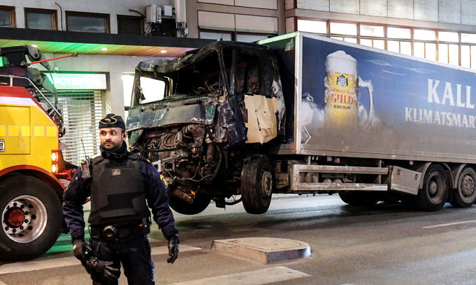 Sweden arrests man for ‘terrorist crime’ after truck attack