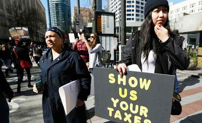 Protesters across US press Trump to release tax returns