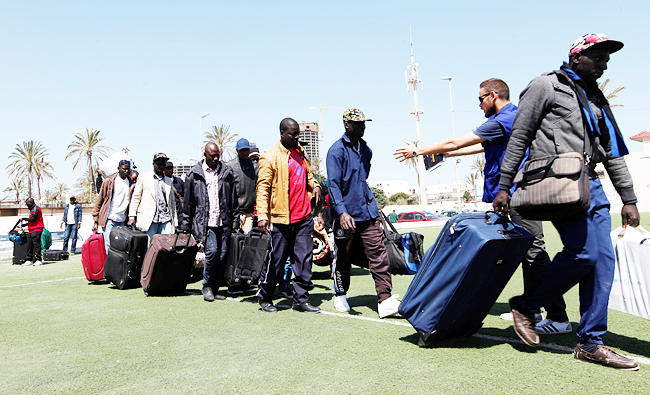 Migrants flee Libya as weather warms and Libyan patrols loom