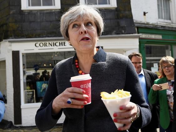 British PM scorned for ‘awkward’ chip eating photos