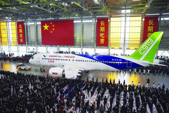 China’s homemade passenger jet aces first flight