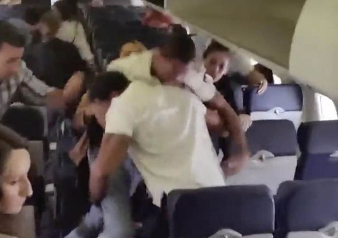 Video: Brawl breaks out on US flight as passengers scream, flee