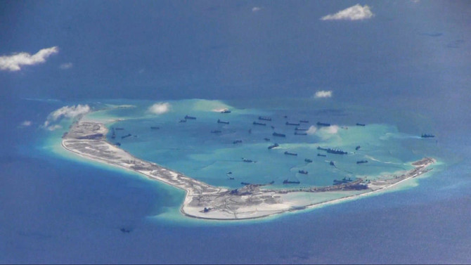 US Navy ship sails near South China Sea reef claimed by Beijing: US official