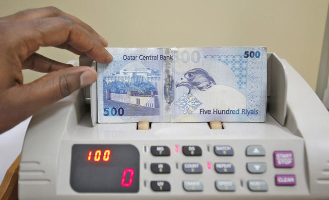 Global exchanges, banks refusing Qatari riyals amid crisis