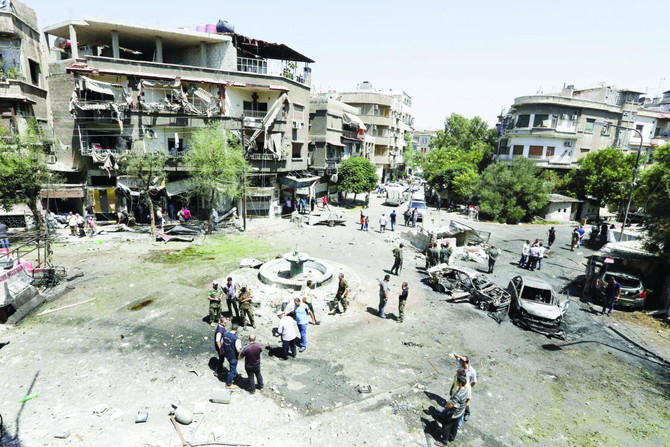 20 killed as three car bombs rock Damascus