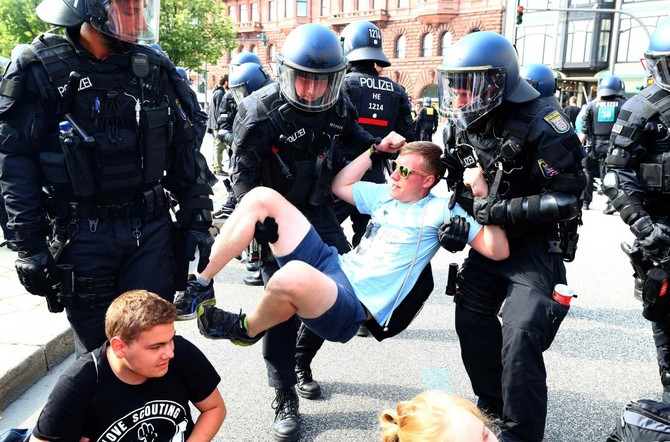 German states send more police to Hamburg as G-20 violence escalates