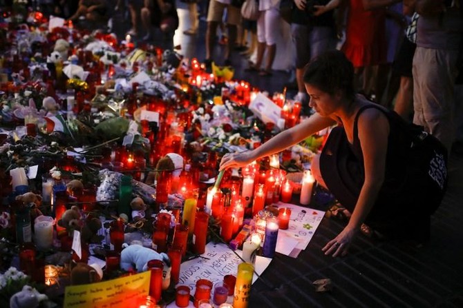 ’Not afraid’: defiant Barcelona to march against terror