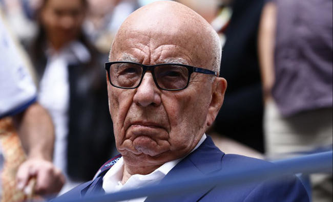 Murdoch’s UK firm pays damages to ex-spy in hacking scandal