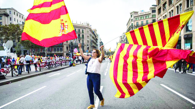 Spain urges polls as pressure mounts on Catalan separatists