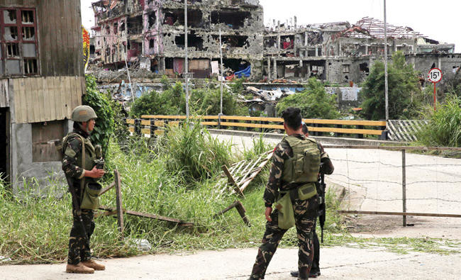 Surrender or die: Filipino troops battling final 30 Daesh-linked gunmen