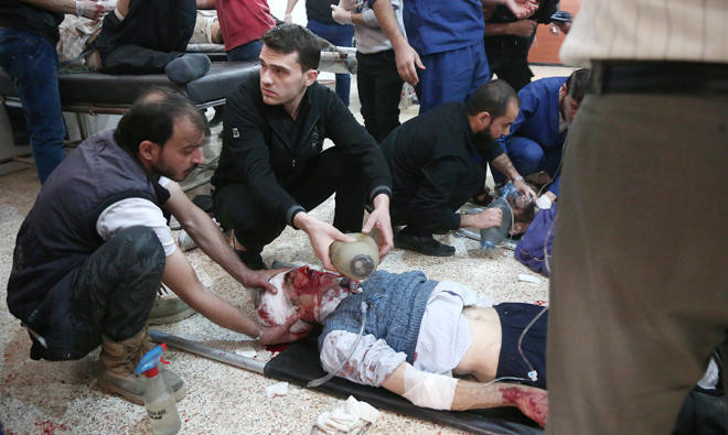 Syrian regime shelling kills 11, hits school