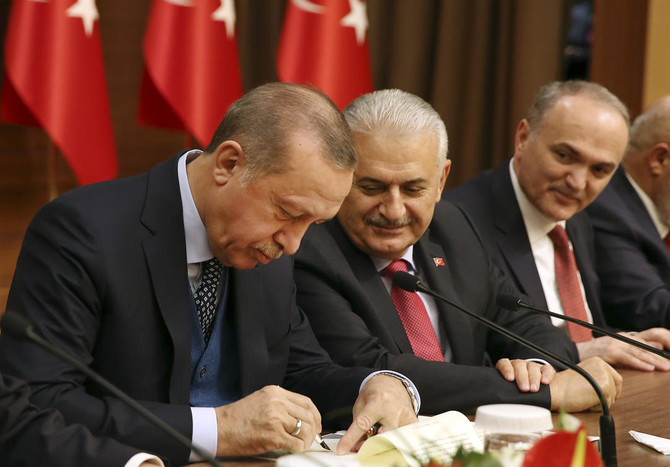 Erdogan signs contentious religious marriages law