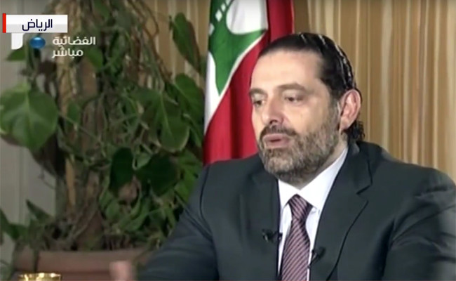 Hariri says Iran to blame for Lebanon crisis, promises to return to his country 'very soon'