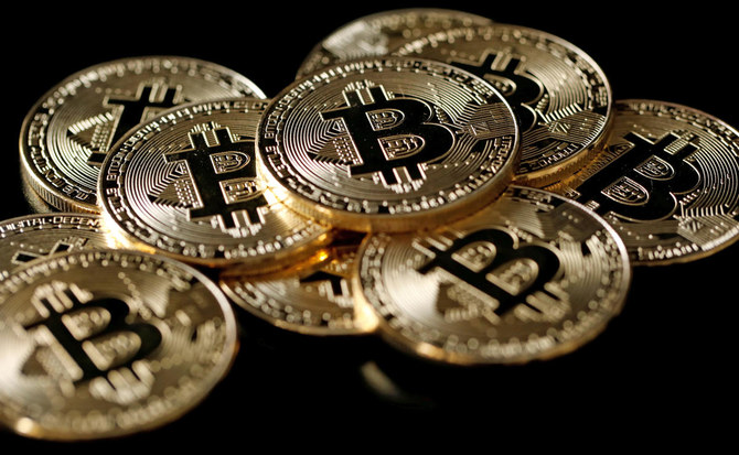 Bitcoin slips below $14,000, down 30 pct from record peak