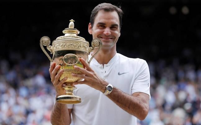 Year in review: Federer rolls on as Woods seeks Majors