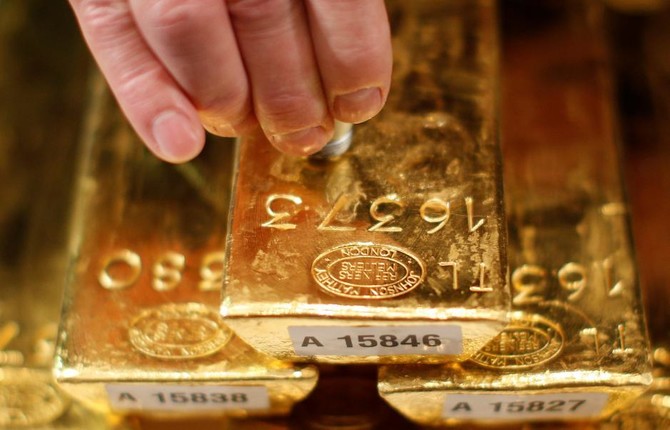 Gold touches $1,300, glittering all the way to best year since 2010