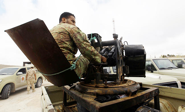 Armed groups clash at key Libya border post
