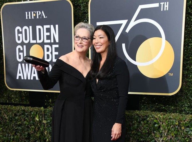 In photos: Golden Globes red carpet transformed by black dress fashion protest
