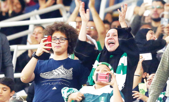A win on the pitch, and in the stands as women enter Saudi stadium after ban lifted