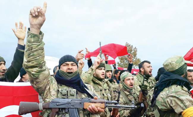 Turkish tanks, troops surge into Afrin