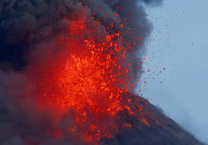Erupting Philippine volcano still swelling with magma below
