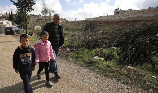 Cut off by Israeli wall, Palestinian family declares ‘republic’