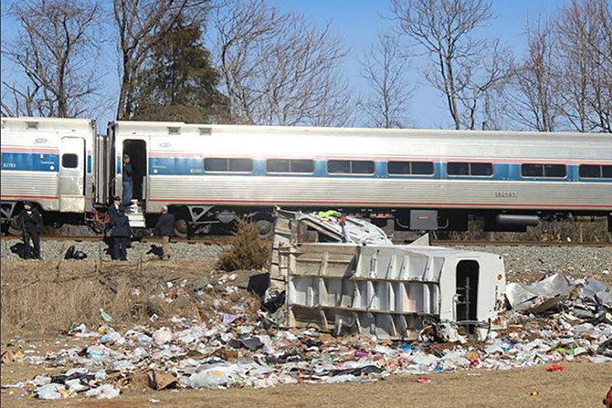 Train carrying US Republicans hits truck, killing one person