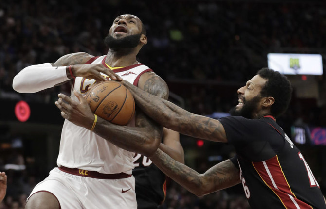 LeBron James, Cavaliers squeeze past Heat