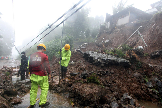 Woman rescued from Indonesia landslide after 13 hours