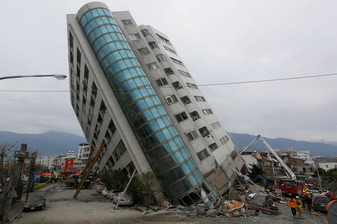 Rescuers scour tilting buildings after Taiwan quake kills seven